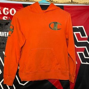 Champion Orange Hoodie with Camouflage Logo